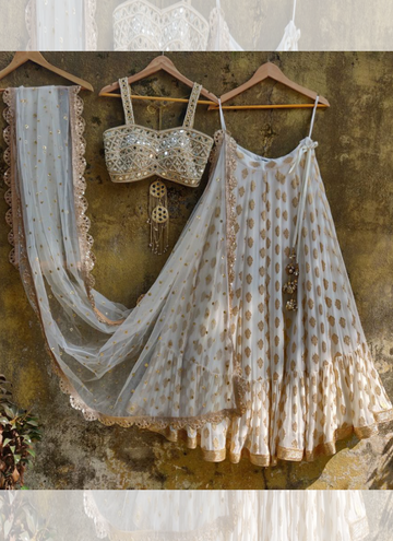 Attractive White Georgette Zari Weaving Ruffle Lehenga Choli